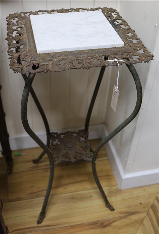 A cast iron and brass plant stand W.38cm